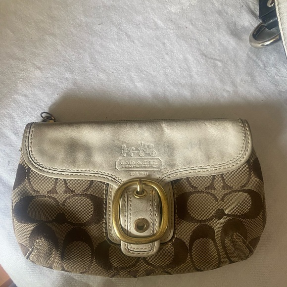 Coach Handbags - Coach white Leather & Signature Fabric clutch 7.5x4.5" Snap Closure